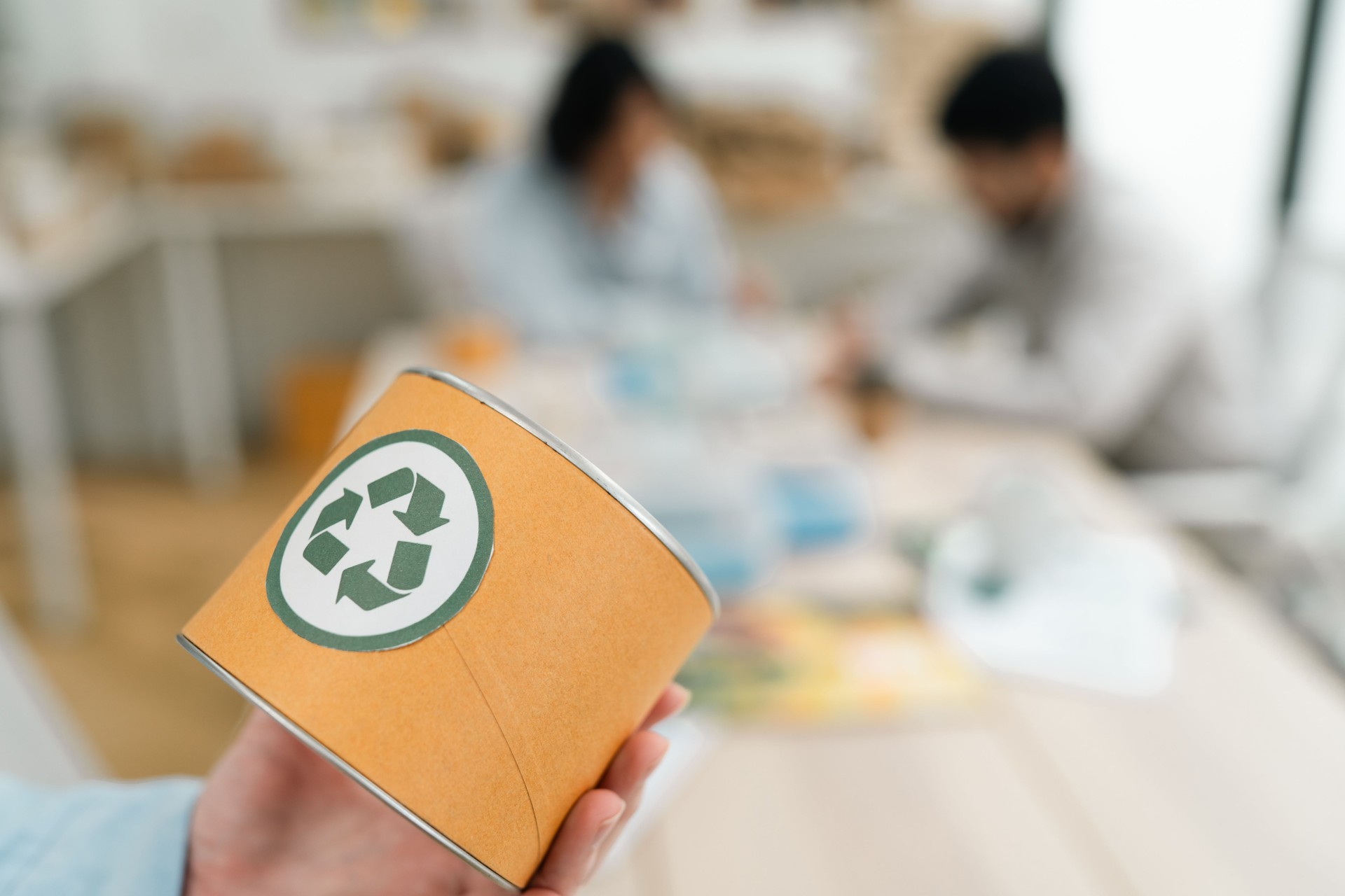 Asian Businesspeople in Brainstorming Meeting, Discussing Sustainable Strategies for ESG, Net Zero Goals, Social Responsibility, Renewable Resources, Carbon Reduction, and Environmental Governance